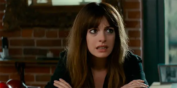 COLOSSAL: Anne Hathaway Towers Over An Uneven Landscape