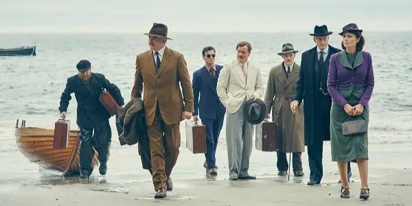 The cast of strangers arrives on the island in "And Then There Were None" (2015) — source: BBC One